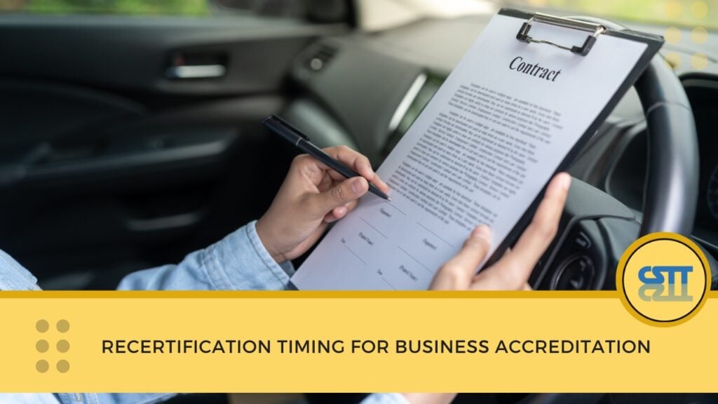 A person inside a car filling out a contract on a clipboard